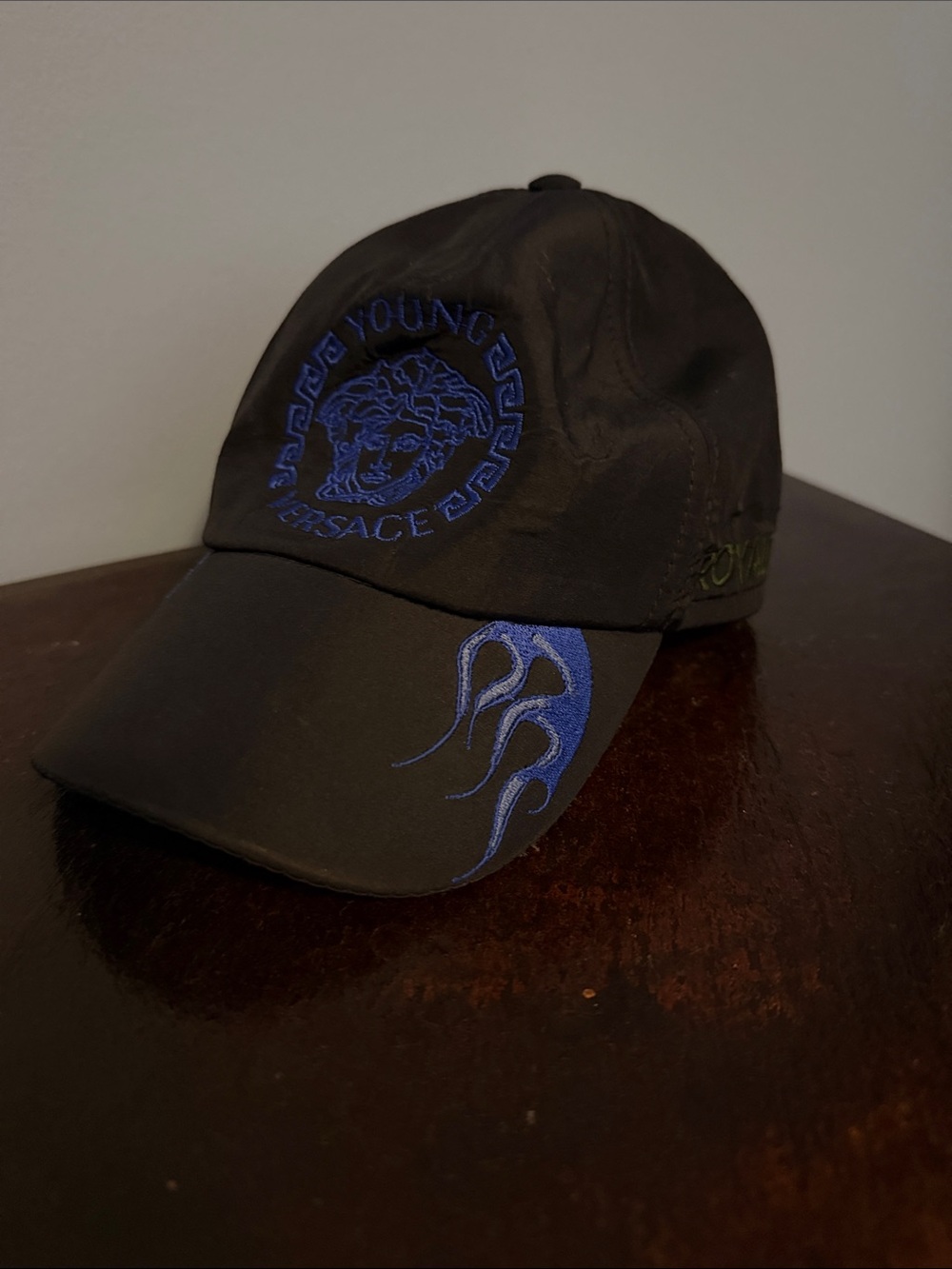 Versace Black Cap with Blue Embroidery and Flame Motif
